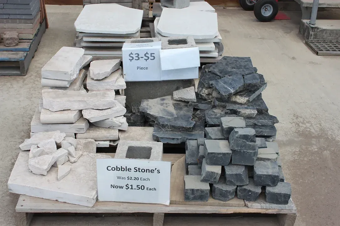 A Wooden Pallet With a Sign That Says Cobble Stone 's on It — Blue River Landscape Supplies in Foulden, QLD