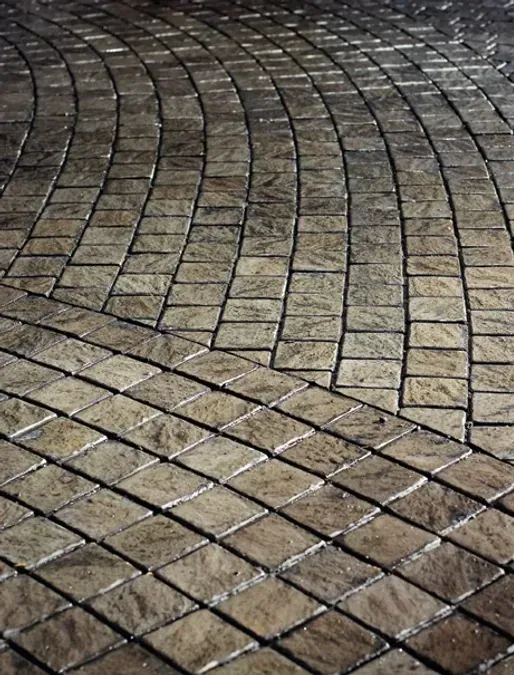 A Close Up of a Brick Floor With a Curved Pattern — Blue River Landscape Supplies in Foulden, QLD