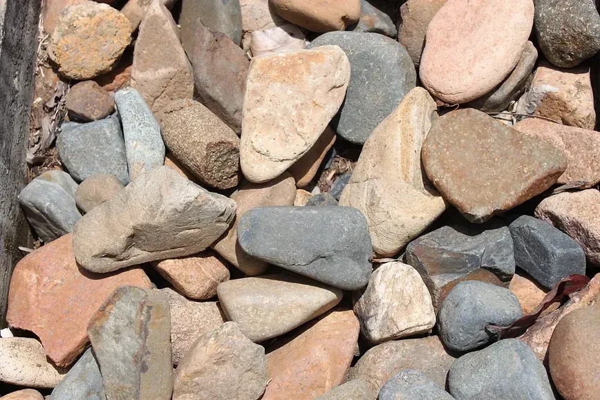 A Pile of Rocks of Different Sizes and Colors — Blue River Landscape Supplies in Foulden, QLD