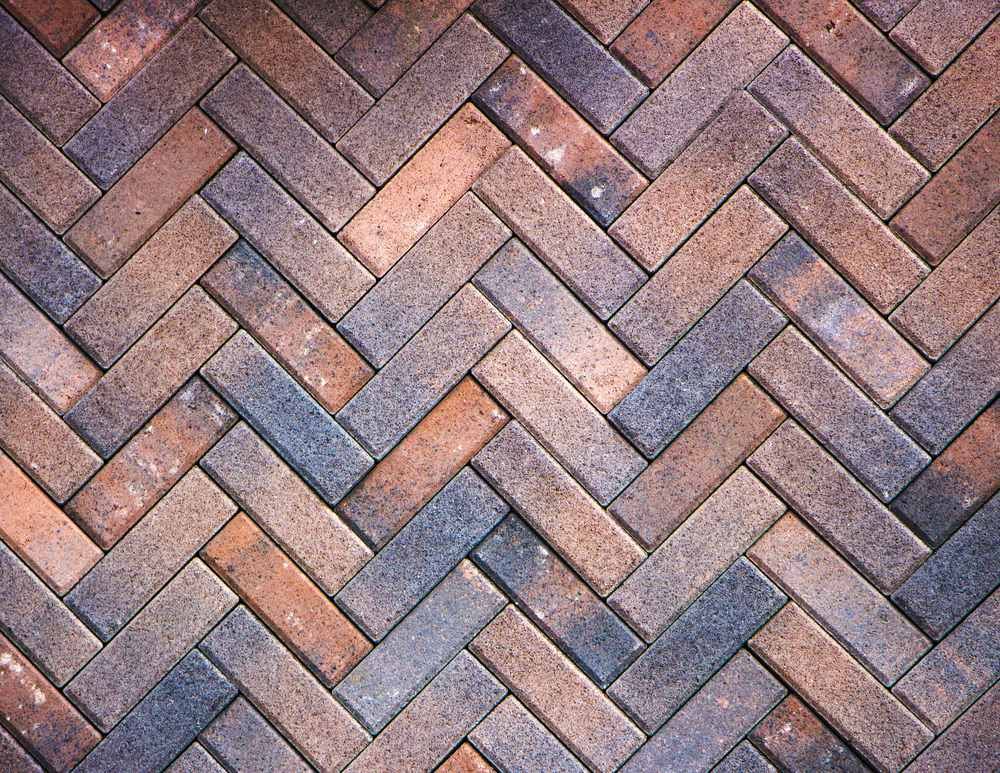 A Path in a Cemetery Surrounded by Trees and Flowers — Blue River Landscape Supplies in Foulden, QLD