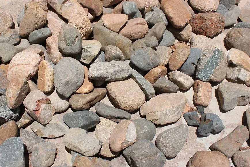 A Pile of Rocks is Laying on the Ground — Blue River Landscape Supplies in Foulden, QLD