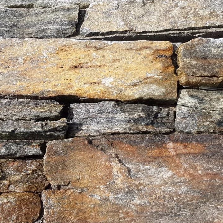 A Close Up of a Stone Wall Made of Different Types of Rocks — Blue River Landscape Supplies in Foulden, QLD