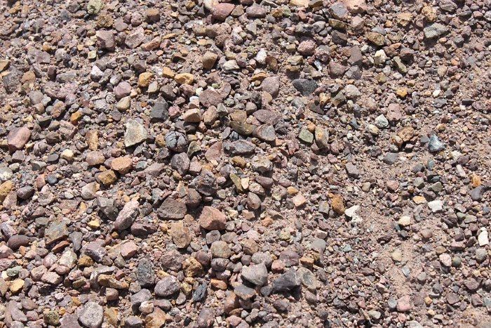 A Pile of Purple Crusher and Dirt on the Ground — Blue River Landscape Supplies in Foulden, QLD