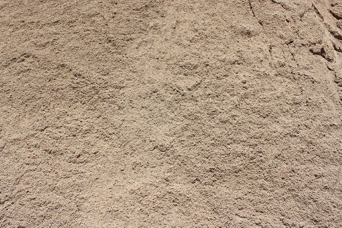 A Pile of Clean Sand is Sitting on a Table — Blue River Landscape Supplies in Foulden, QLD