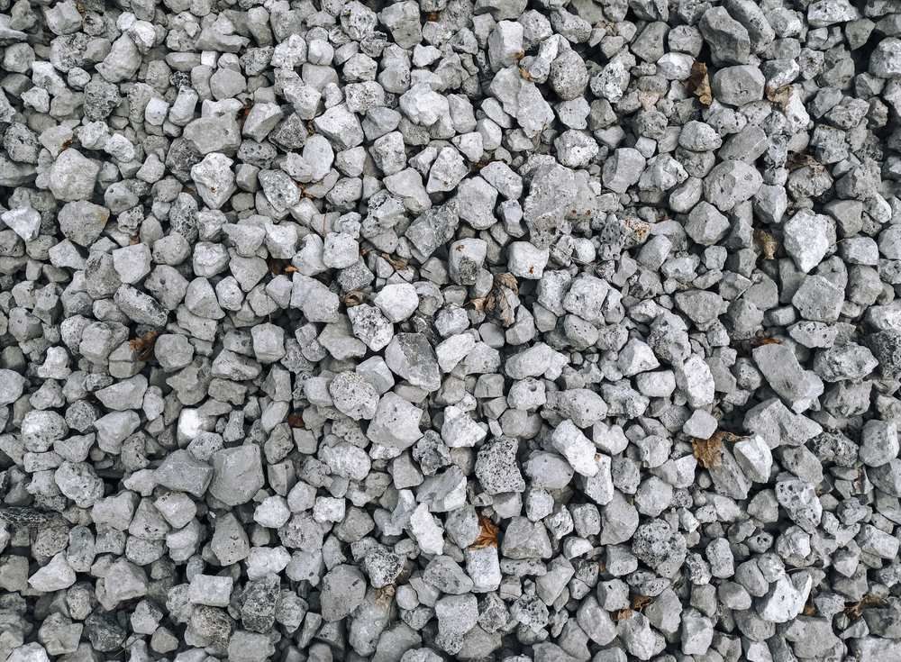 A Pile of Gravel is Sitting on the Ground — Blue River Landscape Supplies in Foulden, QLD