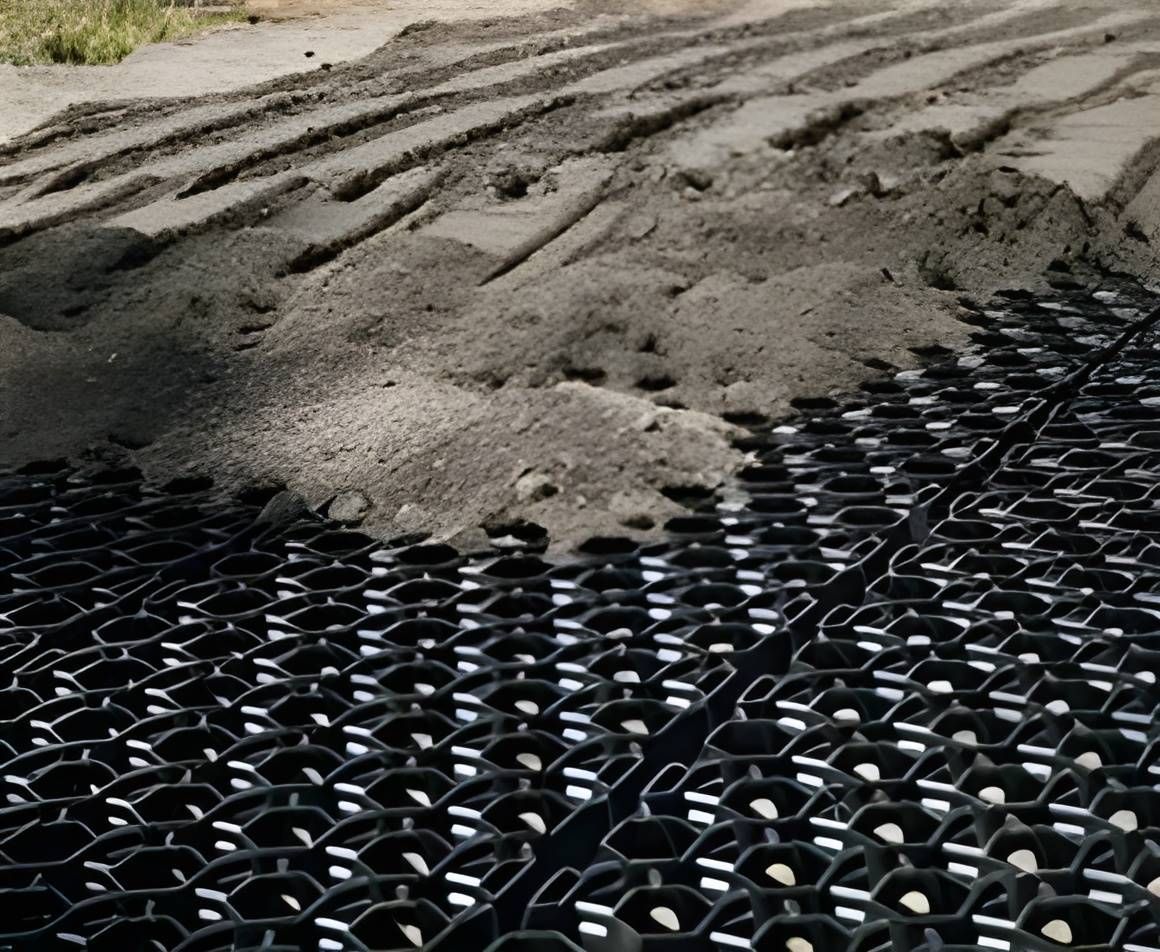 A Pile of Dirt is Sitting on Top of a Plastic Grid — Blue River Landscape Supplies in Foulden, QLD