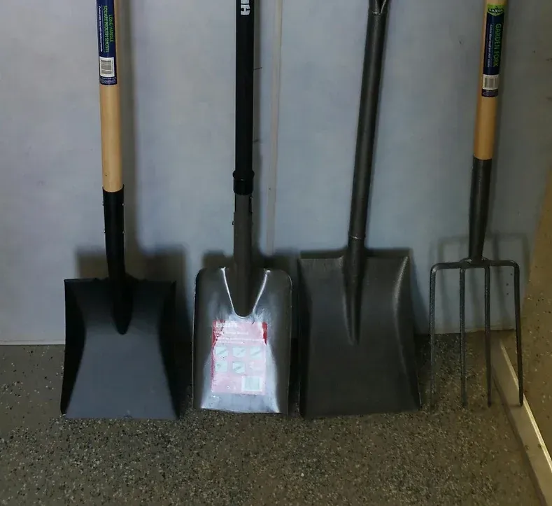 Three Shovels and a Fork Are Lined Up Next to Each Other — Blue River Landscape Supplies in Foulden, QLD