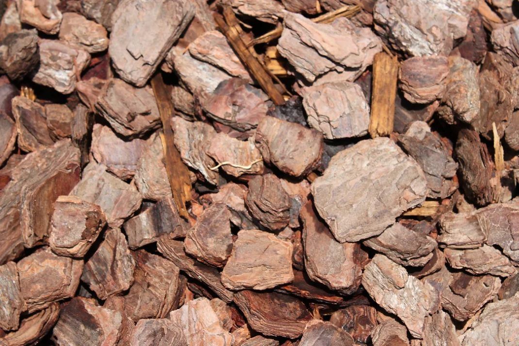 A Pile of Brown Rocks Sitting on Top of Each Other — Blue River Landscape Supplies in Foulden, QLD