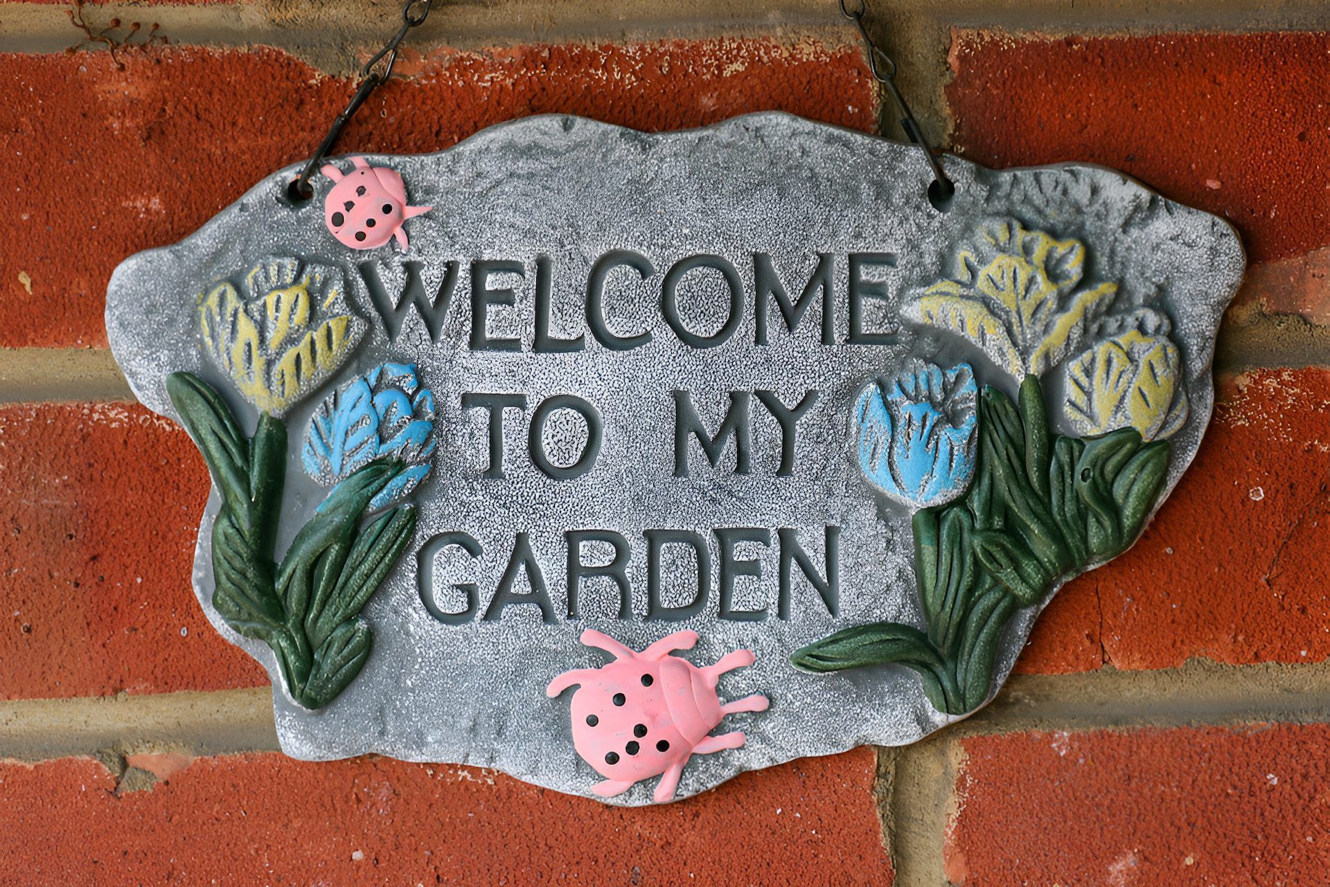 A Path in a Cemetery Surrounded by Trees and Flowers — Blue River Landscape Supplies in Foulden, QLD