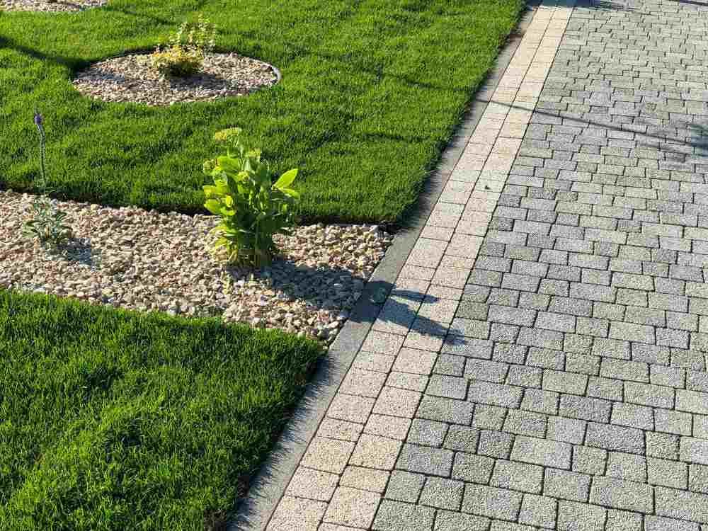 A Brick Walkway Leading to a Lush Green Lawn — Blue River Landscape Supplies in Foulden, QLD