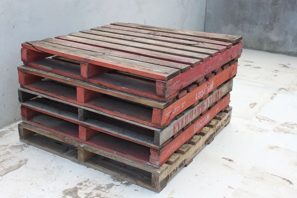 Three Wooden Pallets Are Stacked on Top of Each Other  — Blue River Landscape Supplies in Foulden, QLD