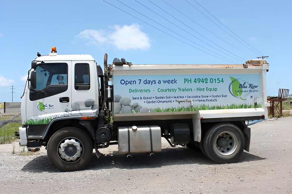 A Dump Truck is Parked on the Side of the Road — Blue River Landscape Supplies in Foulden, QLD