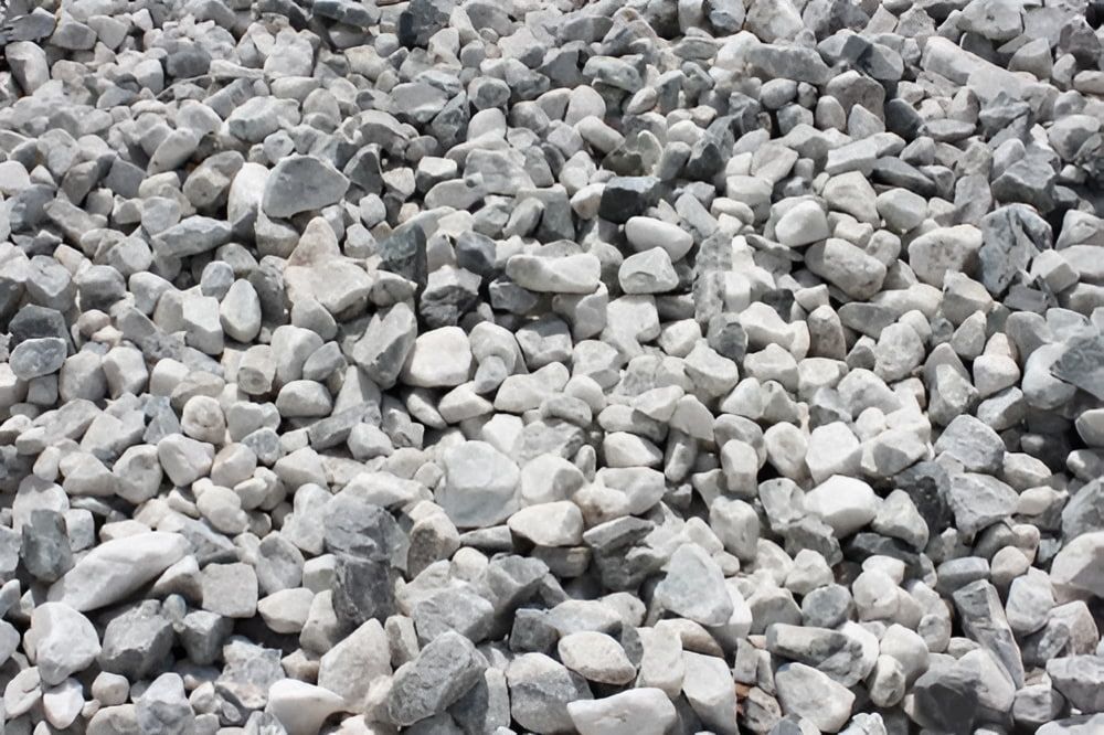 A Pile of Gravel is Sitting on the Ground — Blue River Landscape Supplies in Foulden, QLD
