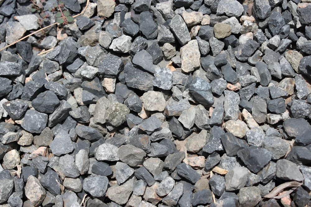 A Pile of Rocks is Sitting on the Ground — Blue River Landscape Supplies in Foulden, QLD