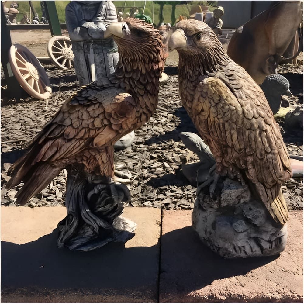 A Couple Of Statues Of Birds Sitting On A Rock — Blue River Landscape Supplies in Foulden, QLD