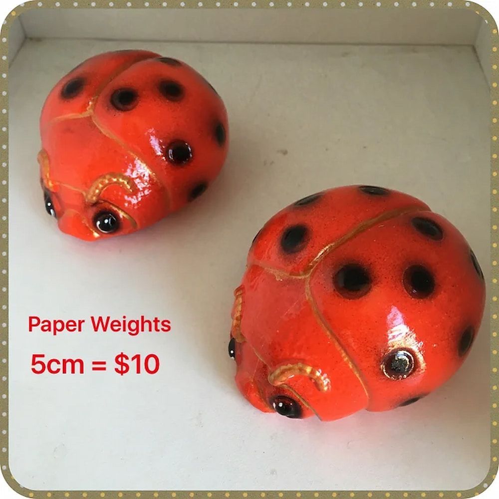 A Ladybug Figurine is Being Sold for $ 10 — Blue River Landscape Supplies in Foulden, QLD