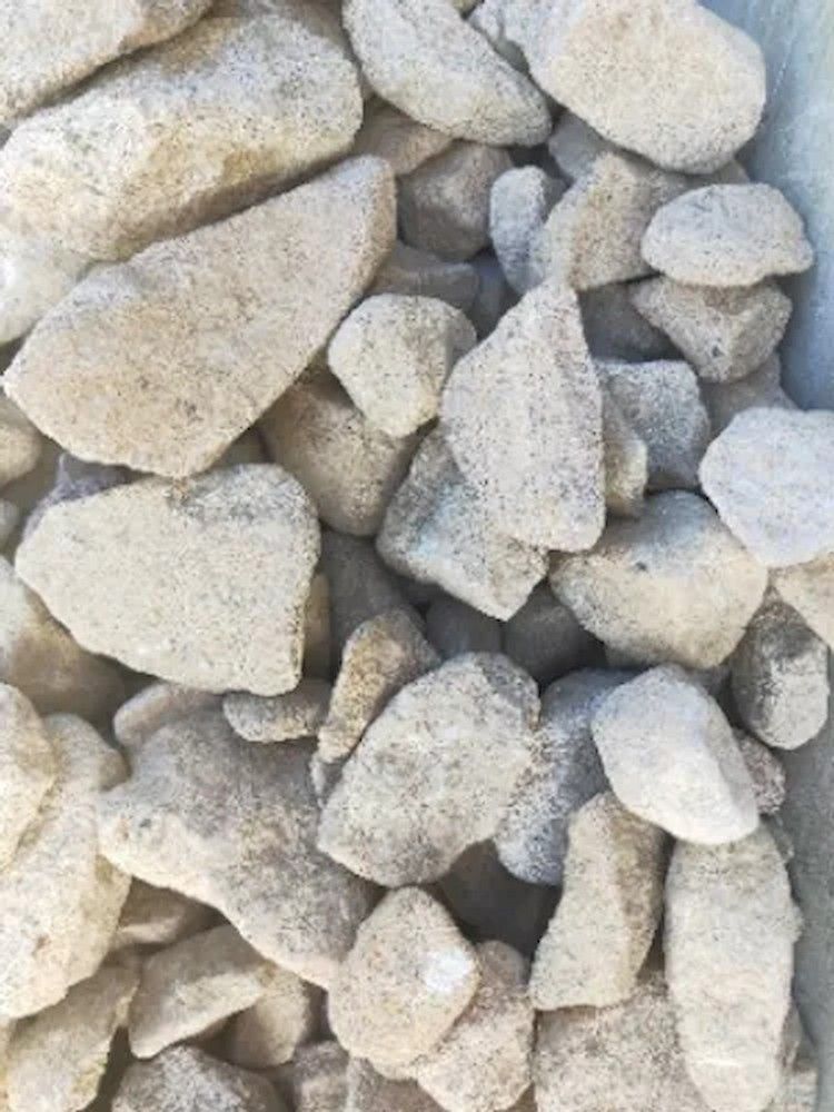 A Pile of Rocks Sitting on Top of Each Other on a Table — Blue River Landscape Supplies in Foulden, QLD