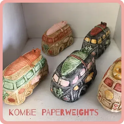 A Display of Kombi Paperweights on a Shelf — Blue River Landscape Supplies in Foulden, QLD
