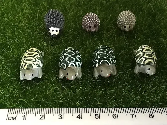 A Group of Hedgehogs Are Sitting on Top of a Ruler — Blue River Landscape Supplies in Foulden, QLD