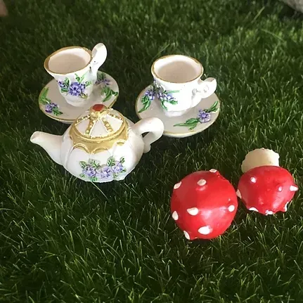 A Tea Set With Two Cups and Saucers and Two Mushrooms — Blue River Landscape Supplies in Foulden, QLD