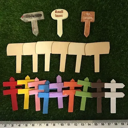 A Bunch of Garden Markers With One That Says Basil — Blue River Landscape Supplies in Foulden, QLD