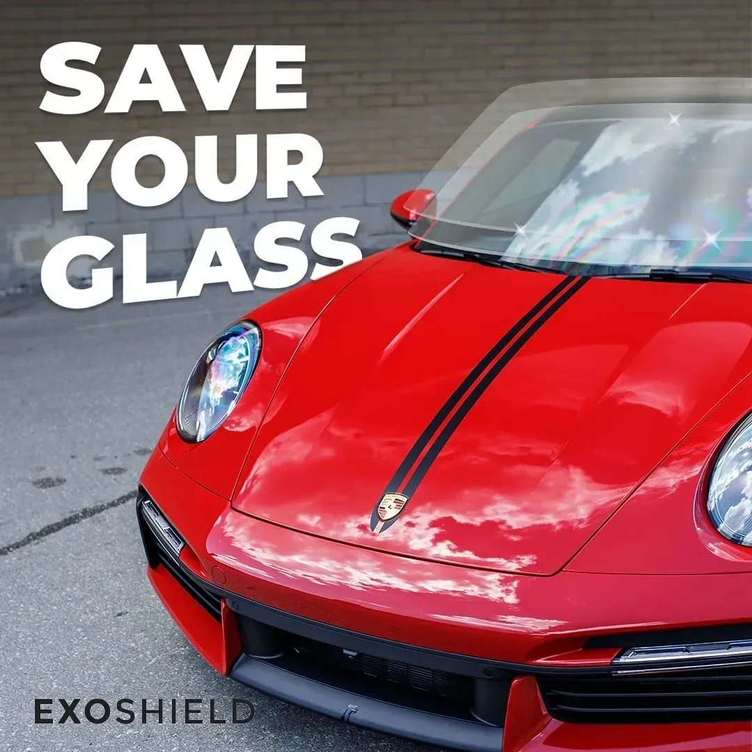 Red sports car with windshield film; 