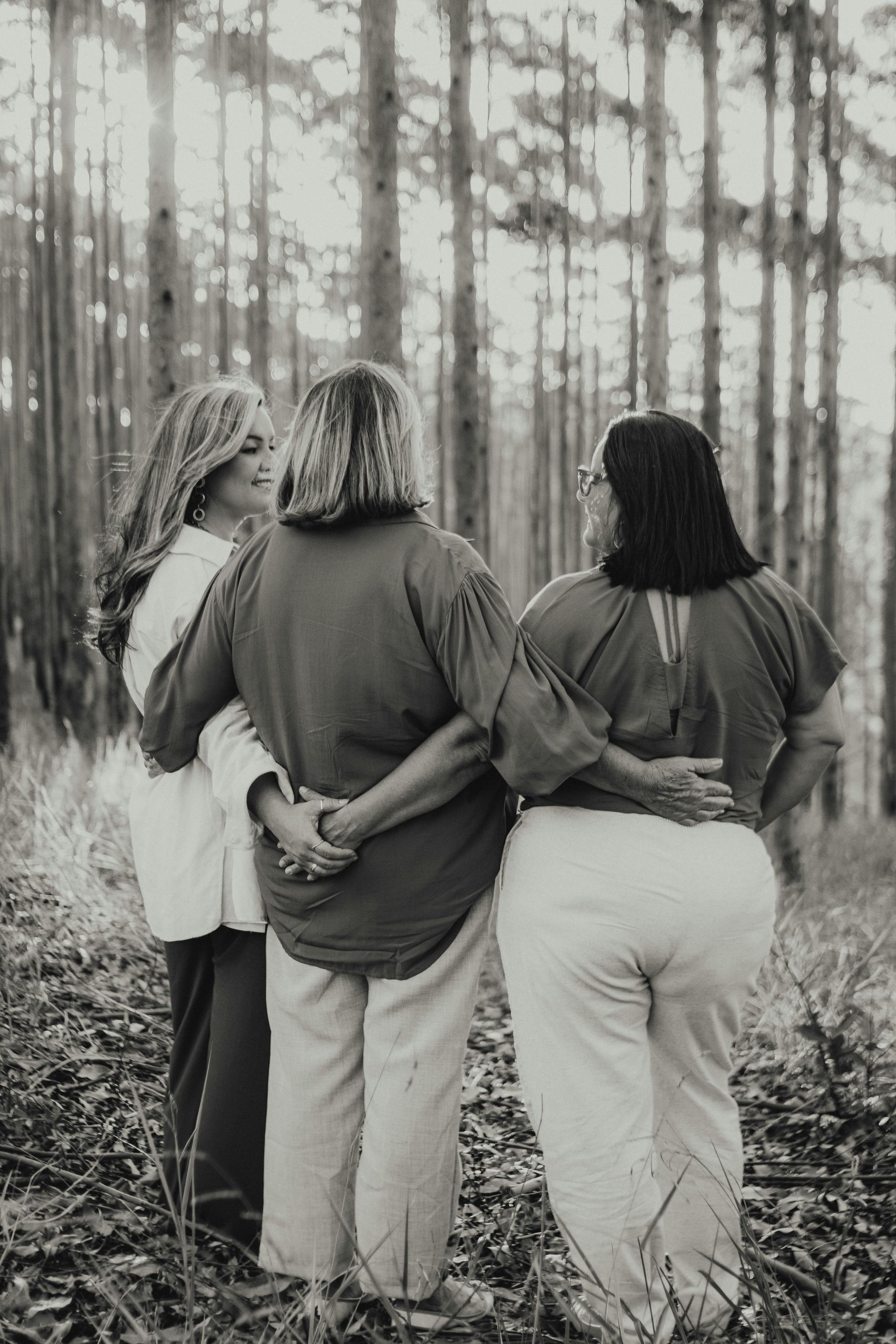 3 women supporting each other.