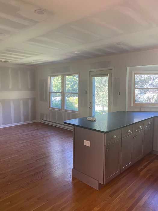 There is a large island in the middle of the room.