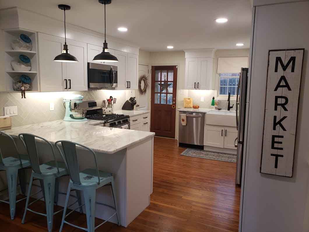 A kitchen with a sign that says market on it.