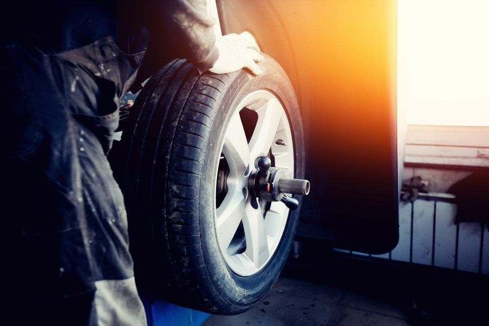 Mechanic Replacing Car Tyre In Coffs Harbour
