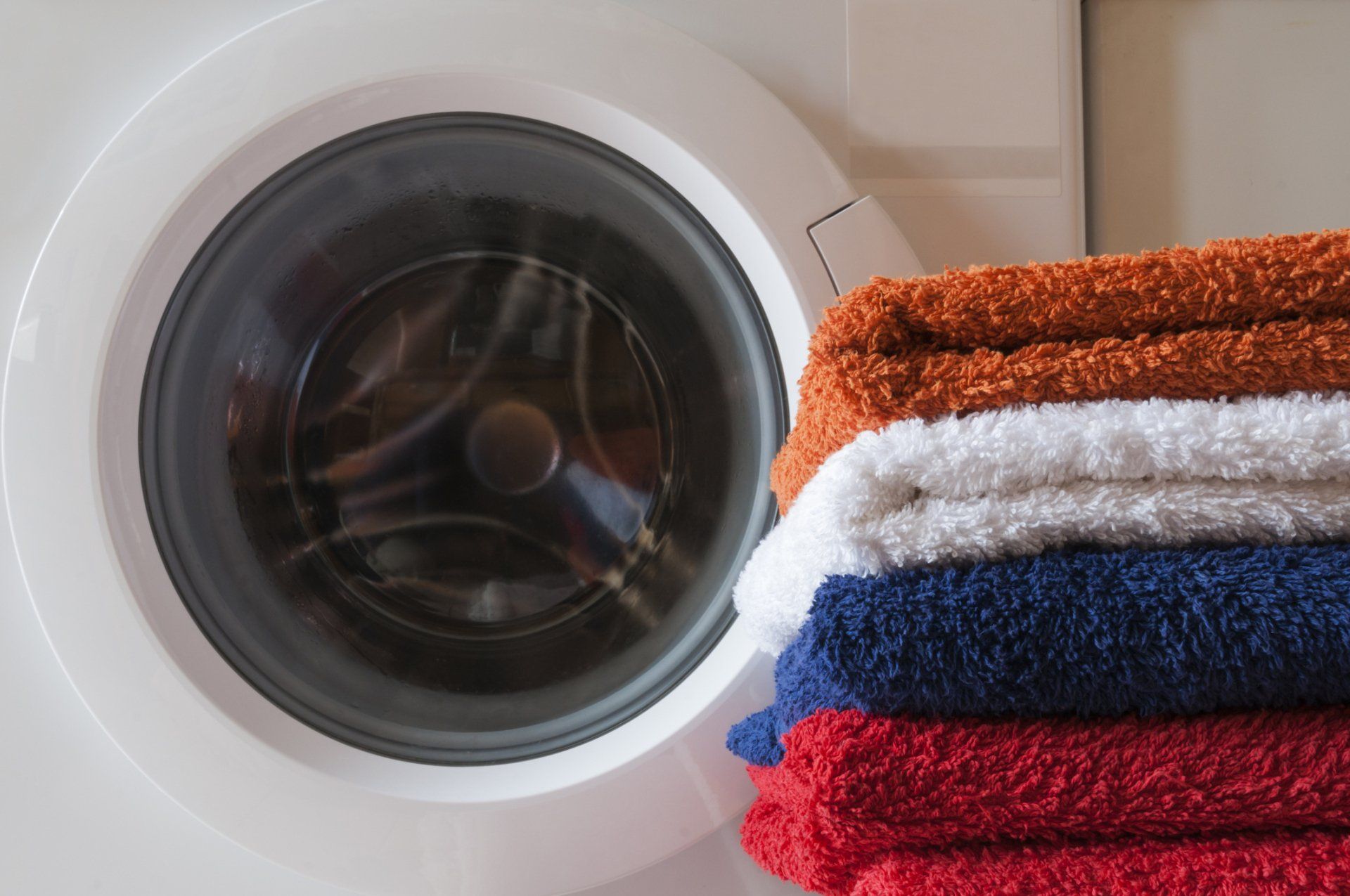 Dryer And A Stack Of Colorful Towels — Robertson, TN — Jeff Delong Repair Service