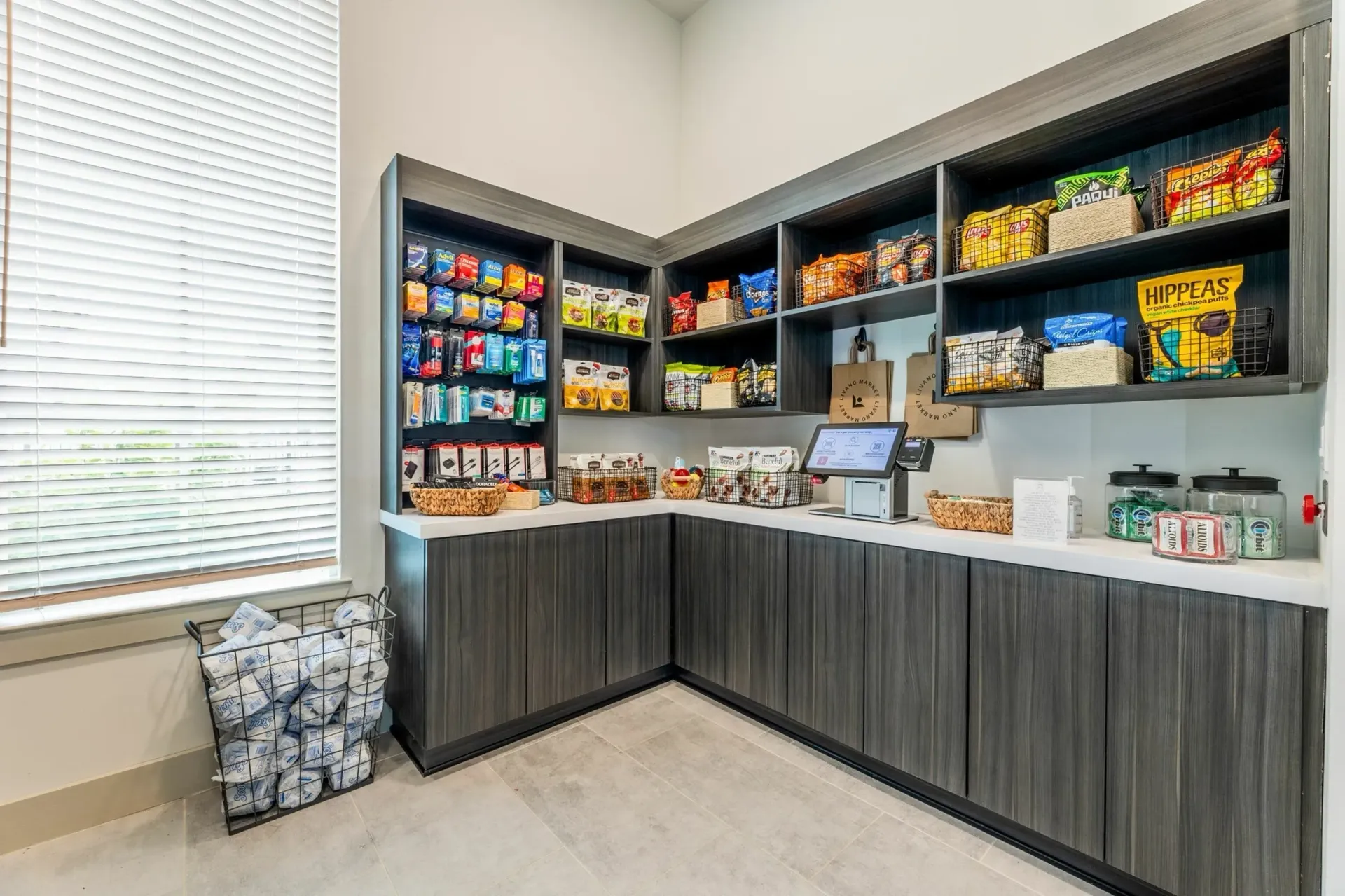 Marketplace with snacks, drinks, and convenience items available for purchase.