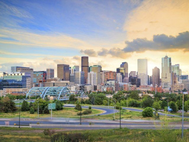 Panorama of Denver skyline at twilight.