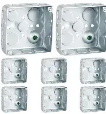 White 3D-printed cube modules with rounded corner details stacked in a cluster