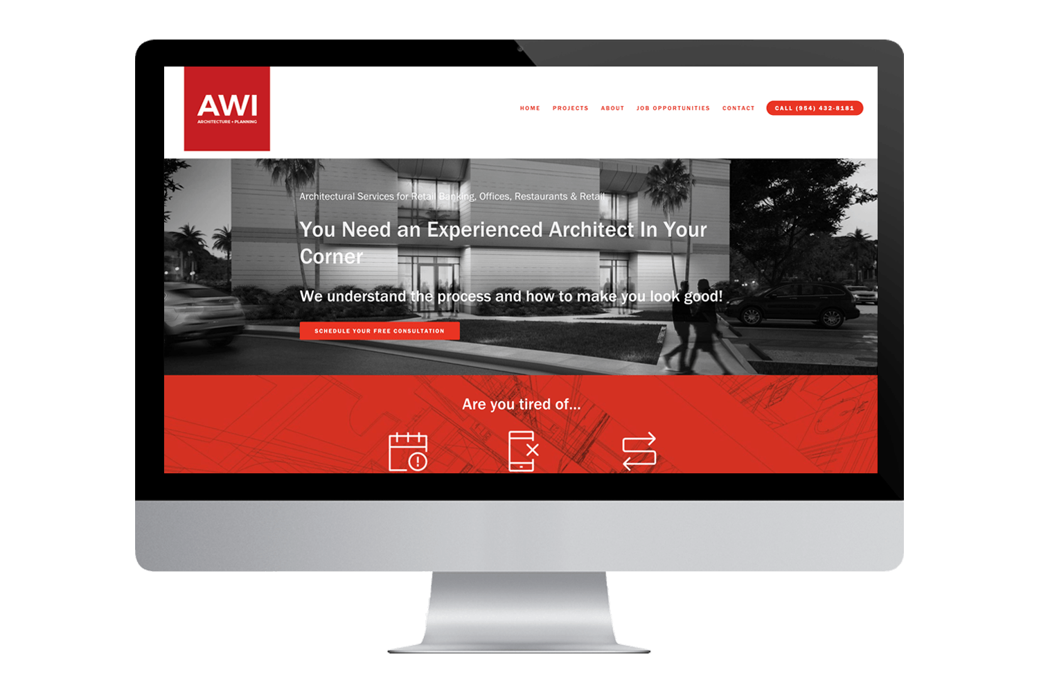 a computer monitor displays the website for arcwerks architectural services