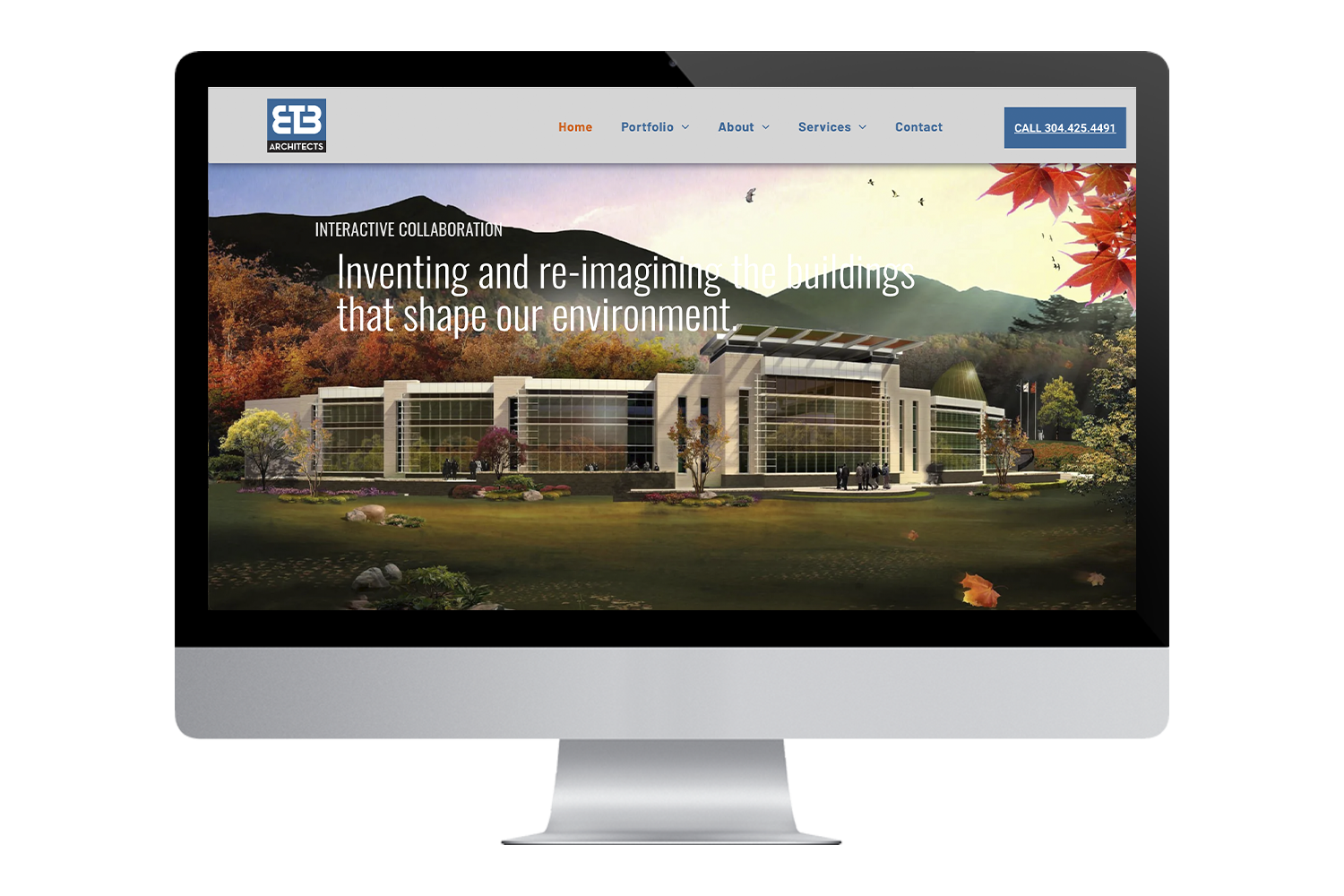 a computer monitor displays the website for etb architects