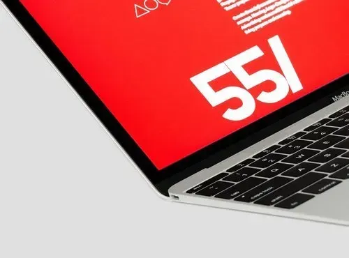 A laptop with the number 55 on the screen
