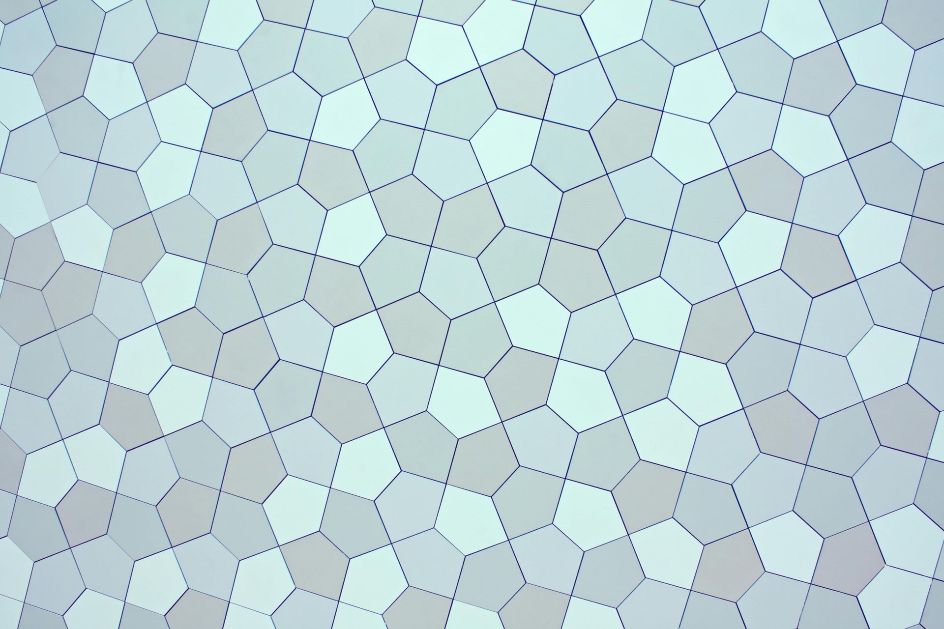 A close up of a gray and white hexagon pattern
