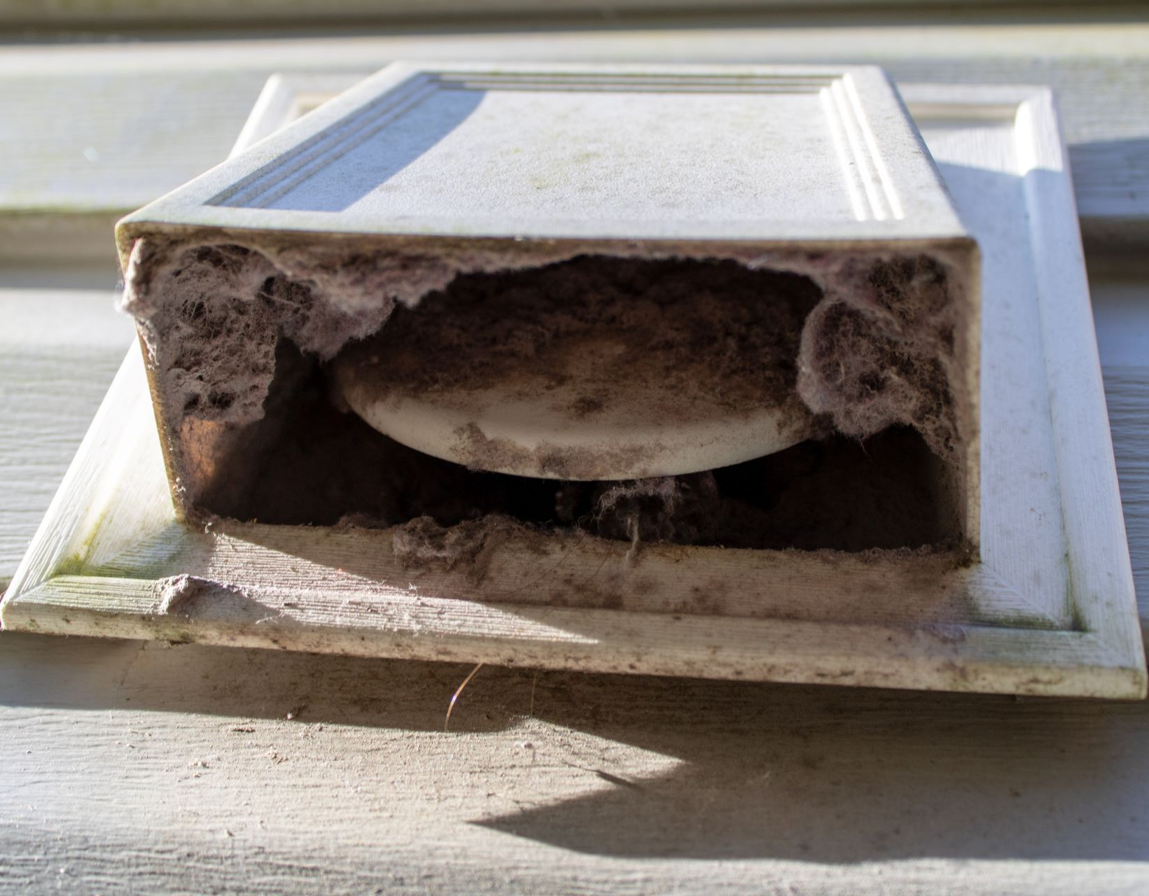 signs of clogged dryer vent