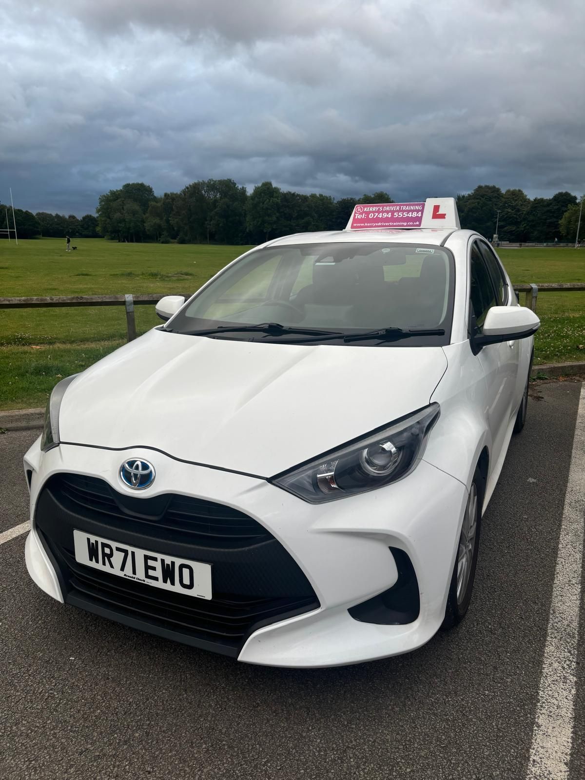 White Toyota Yaris with 