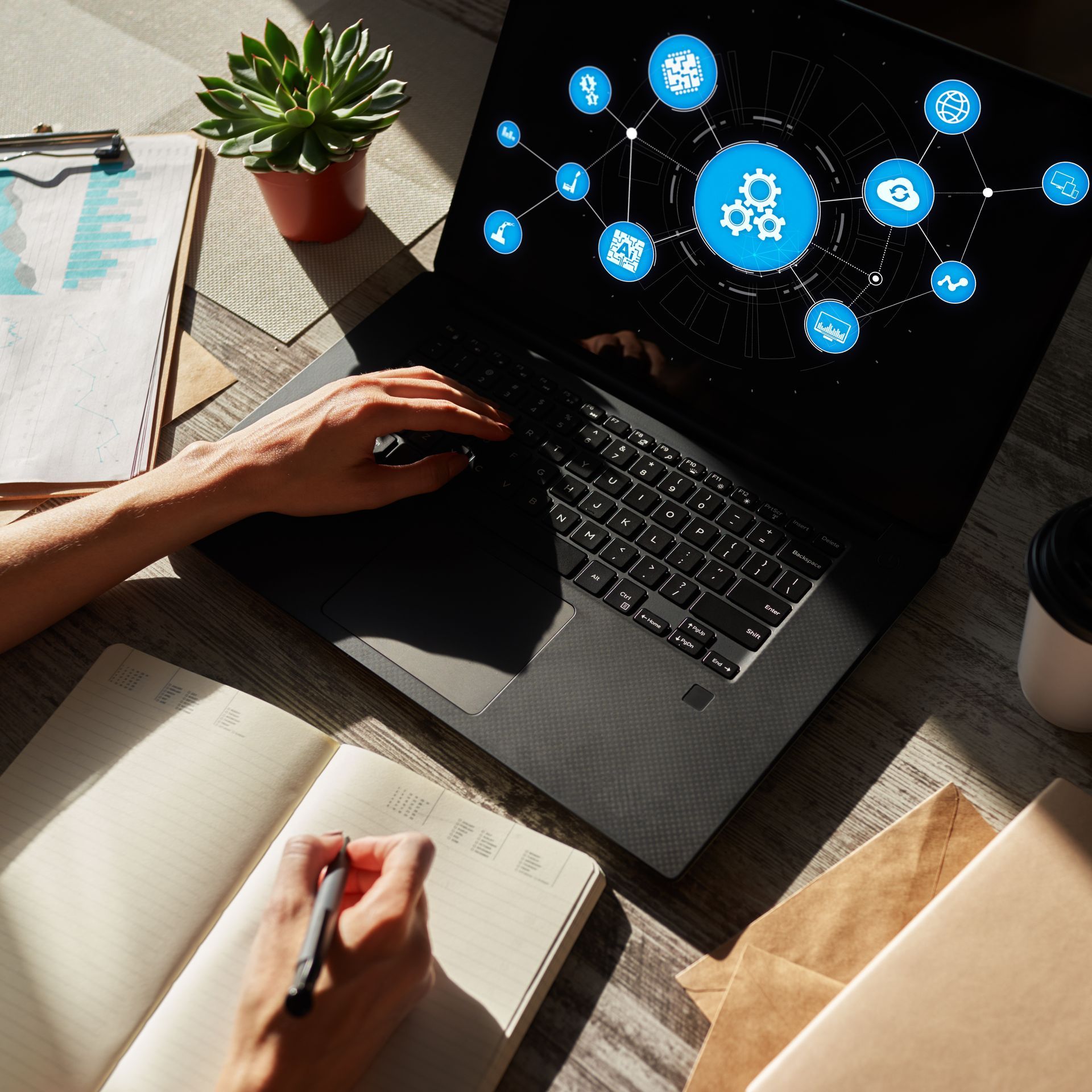 A large office building with a lot of windows on a sunny day.