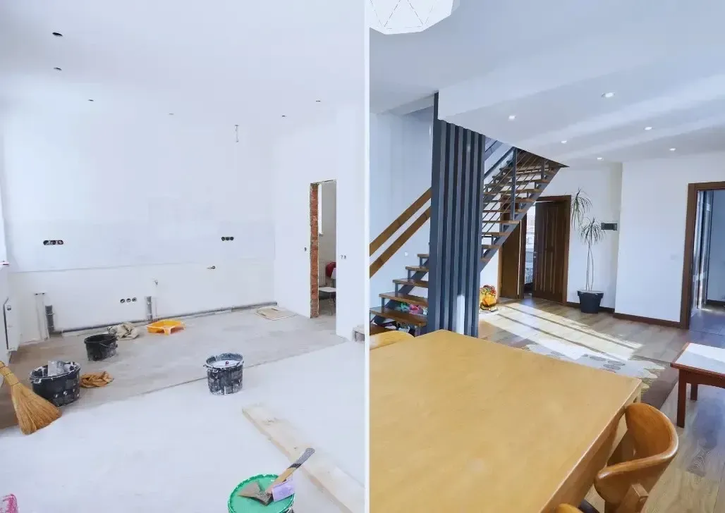 Split-house renovation: left side unfinished with exposed beams, right side fully restored with fresh paint and intact roof.