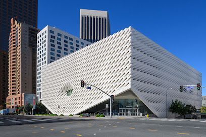 The Broad's honeycomb-like white exterior glowing in sunlight against a blue sky