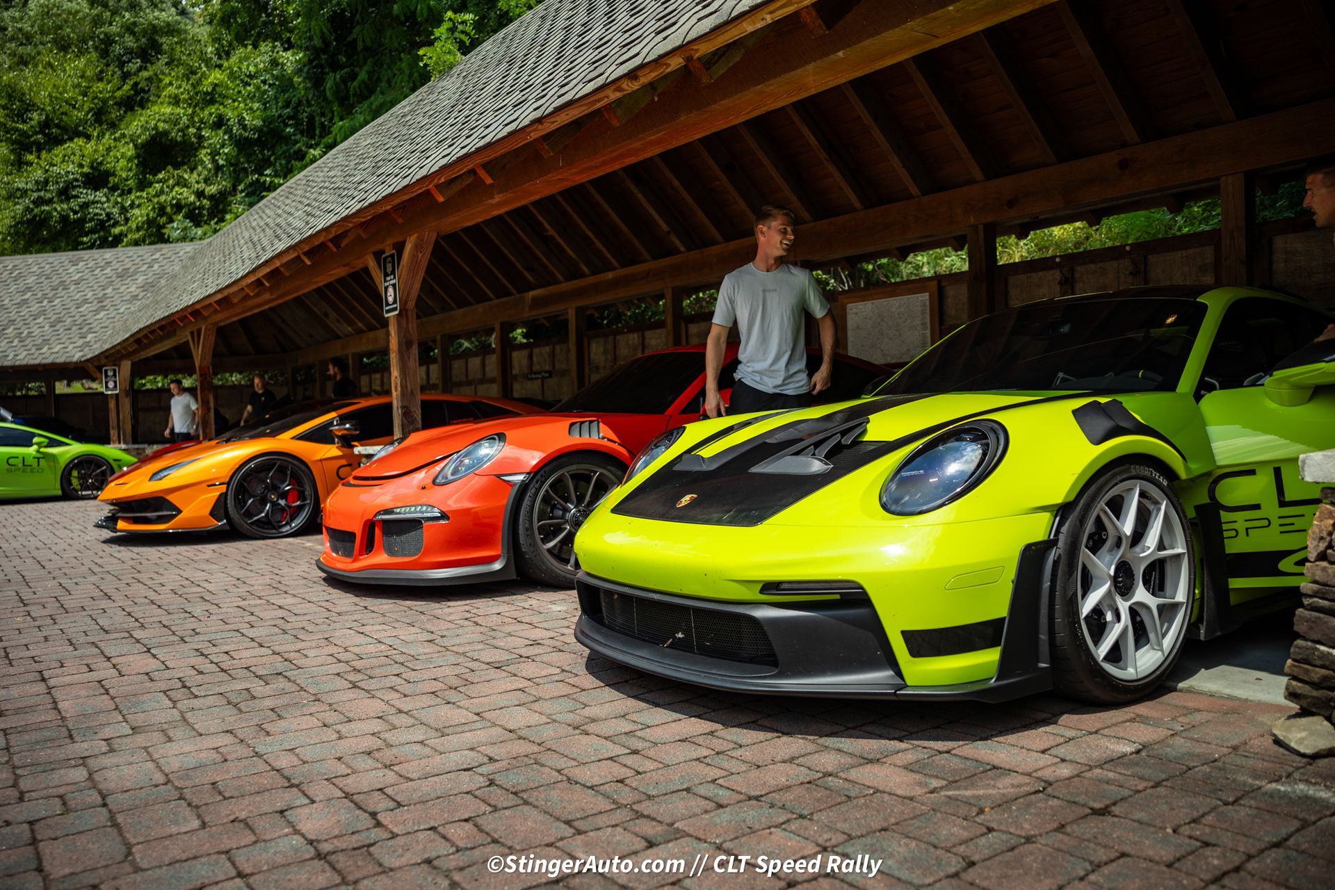 Porsches parked in a garage