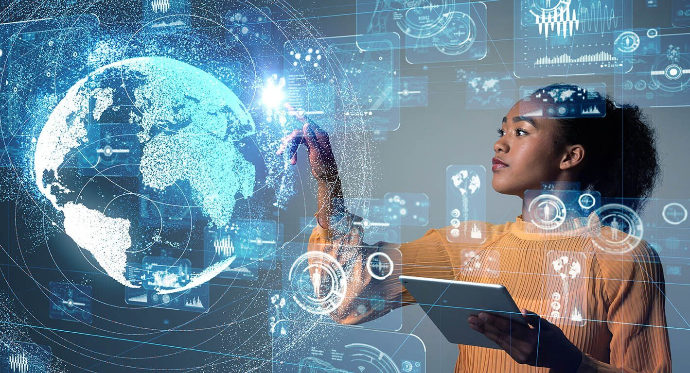 A woman is holding a tablet and touching a screen with a globe in the background.