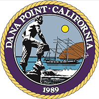 The seal of dana point california shows a man sitting on a rock