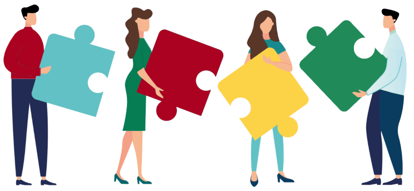 Four people standing in a row, each holding a different colored puzzle piece, representing teamwork and collaboration.