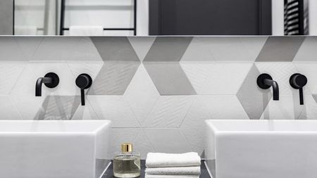 A Clean Bathroom with Two Sinks and A Bathtub — Peninsula Tiles in Umina Beach, NSW