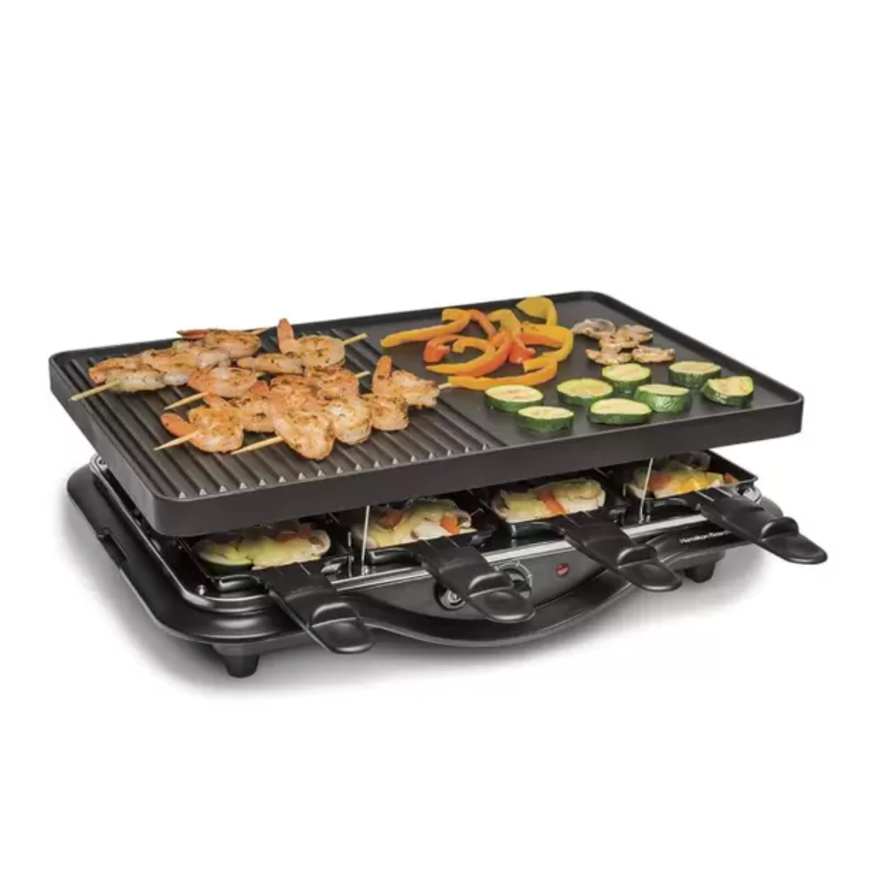 Uma grelha com camarão e vegetais