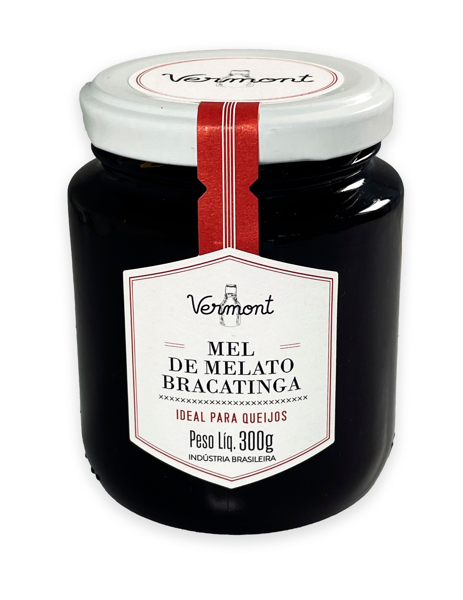 Um pote de mel de Vermont está sobre um fundo branco.